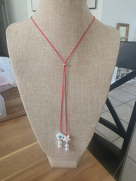 Hilo rojo con estrella