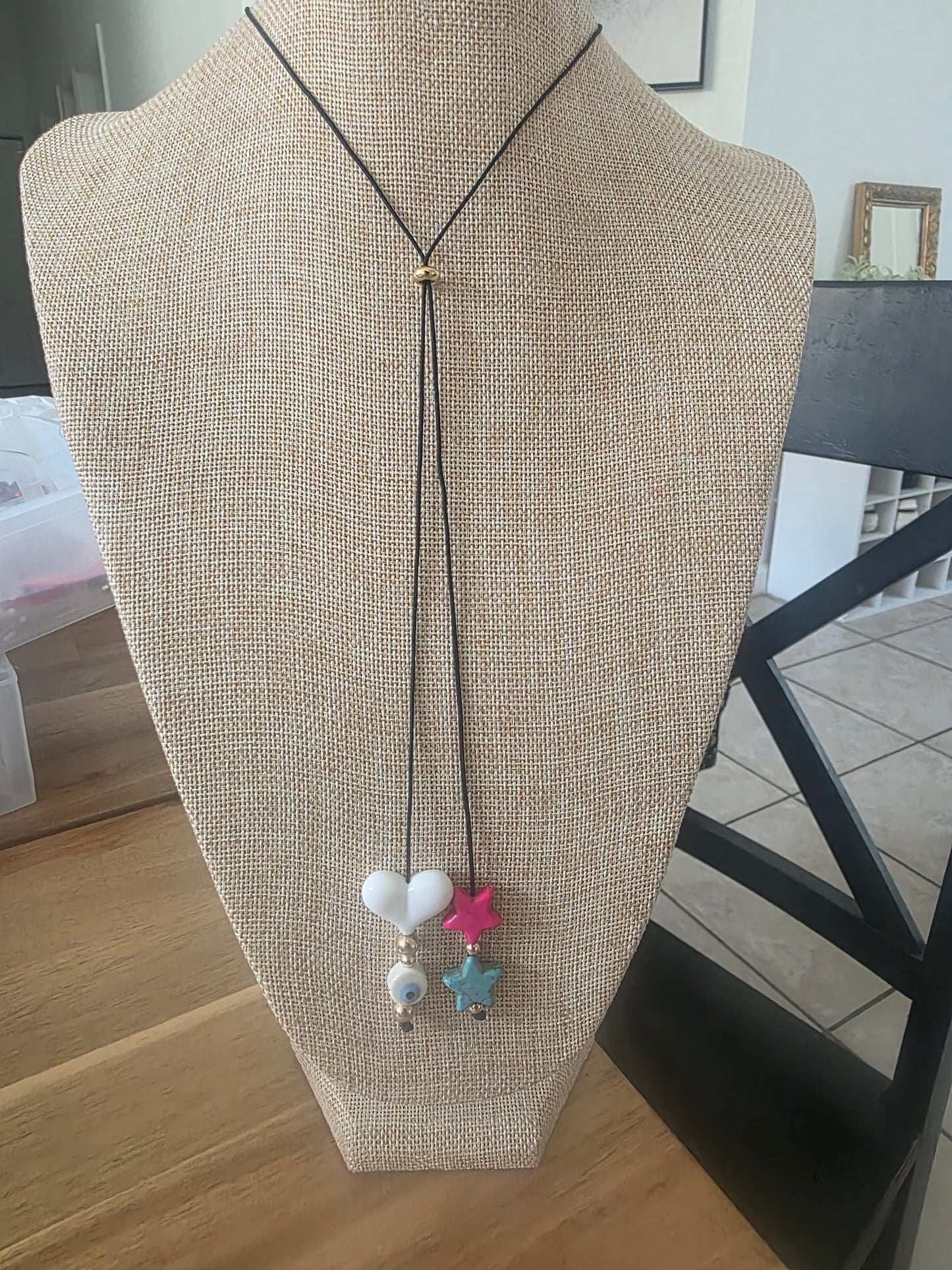 Black cord with heart