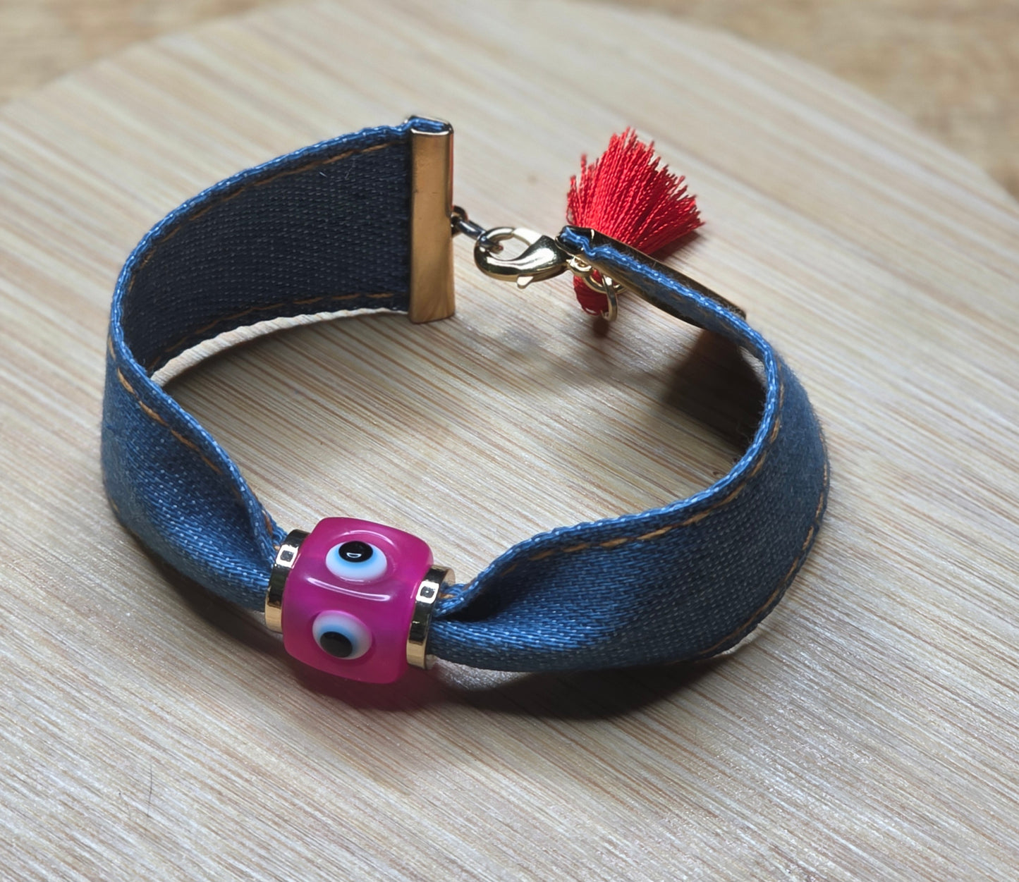Pink jean evil eye bracelet