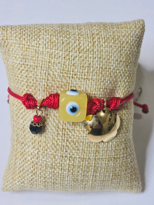 Yellow azabache evil eye bracelet